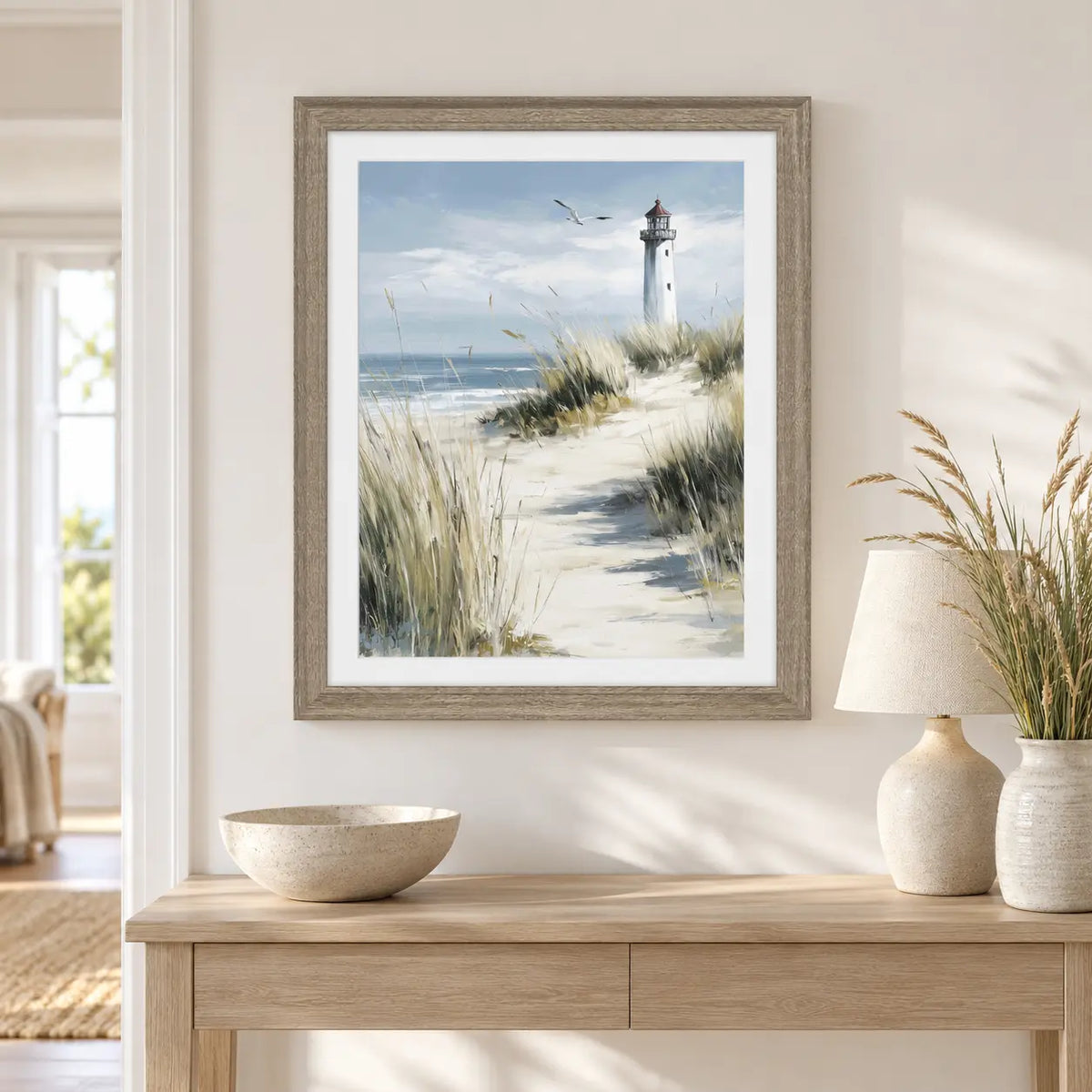 Artko Harbour Watch Lighthouse framed coastal wall art styled above a console