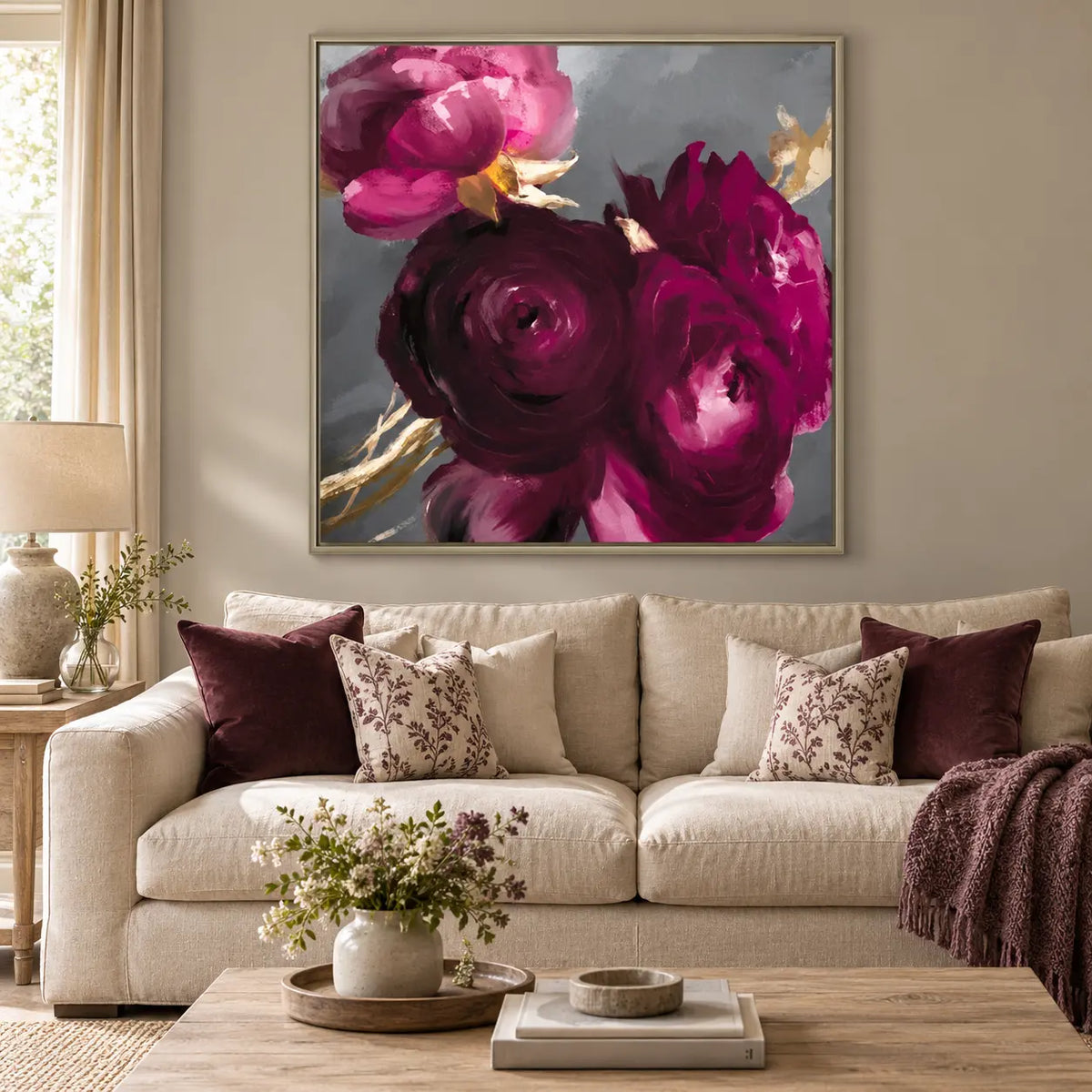 Artko Plum Ranunculus extra large framed floral canvas styled above a sofa