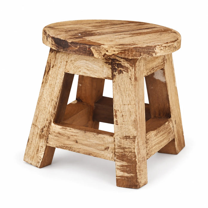 Rustic Farmhouse Wooden Mini Stool in Natural Pine, showing its round top and splayed legs against a white background.