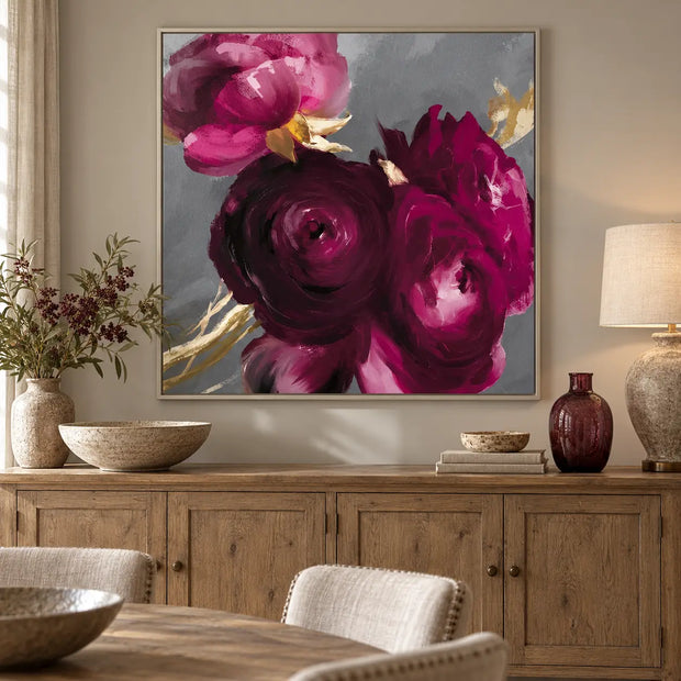 Artko Plum Ranunculus extra large framed floral canvas styled above an oak sideboard
