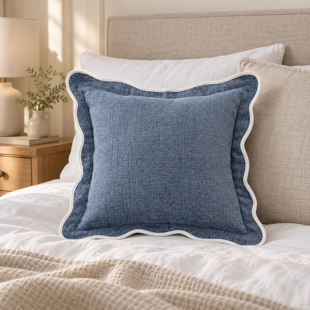 Light blue and white scalloped cushion cover from Starlight Express, featuring soft furnishings for bedroom decor.