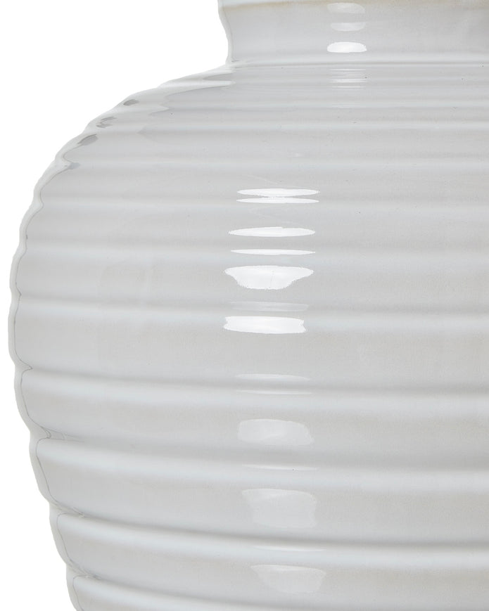 White ceramic ribbed urn-style lamp from Hill Interiors, stylish lighting fixture with a smooth, rounded design.