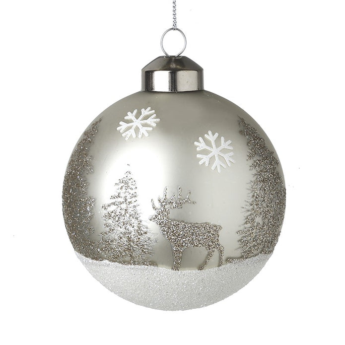Silver glitter glass winter scene bauble with stag, fir trees, white snowflakes and snowy base