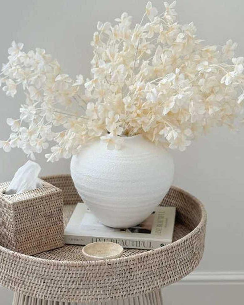 Artificial White Blossom Stem from Starlight Express with delicate white flowers and green foliage, ideal for home or event decor.