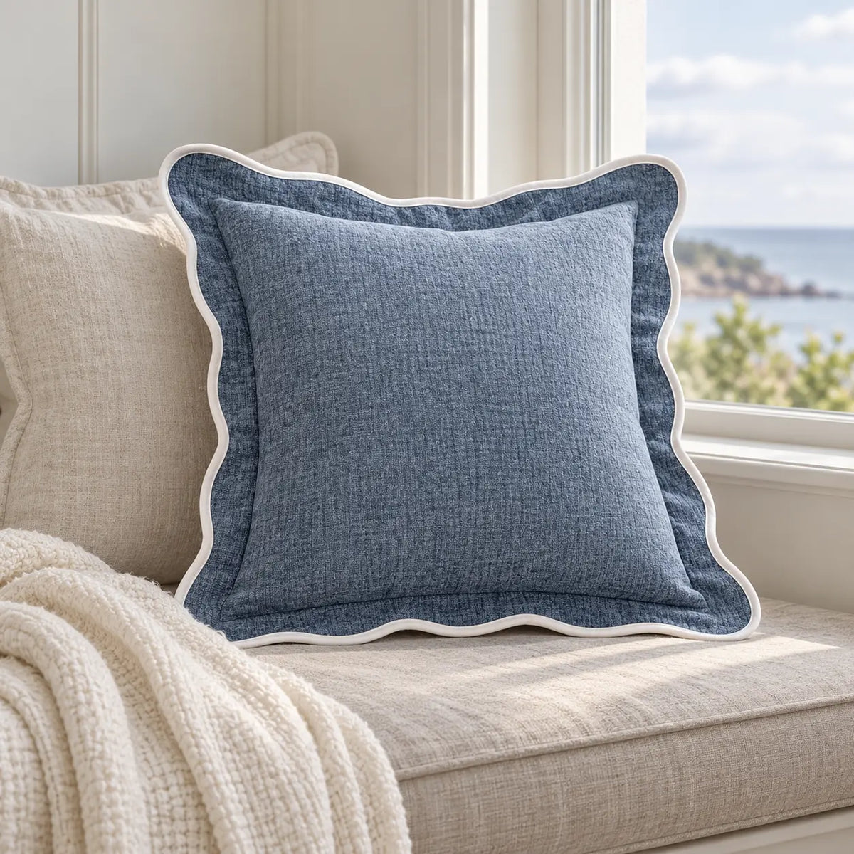 Light blue and white scalloped cushion cover from Starlight Express, soft furnishings for window seats and cozy décor.