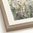 Artko Blossom close-up showing light wood frame, mount and deckled print edge