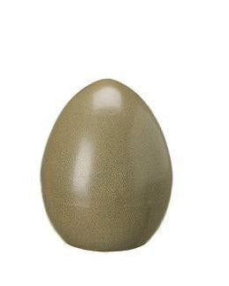 Brown ceramic egg-shaped object on a white background