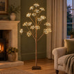 Lightstyle London LED Woodland Christmas tree with glowing lights, decorated with woodland-themed ornaments for festive decor.