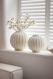 Globe striped decorative vase for home décor from Hill Interiors, featuring a round shape with blue and white striped pattern.
