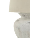 Large stone bath lamp by Hill Interiors, stylish lighting fixture with a natural stone finish for bathroom decor.