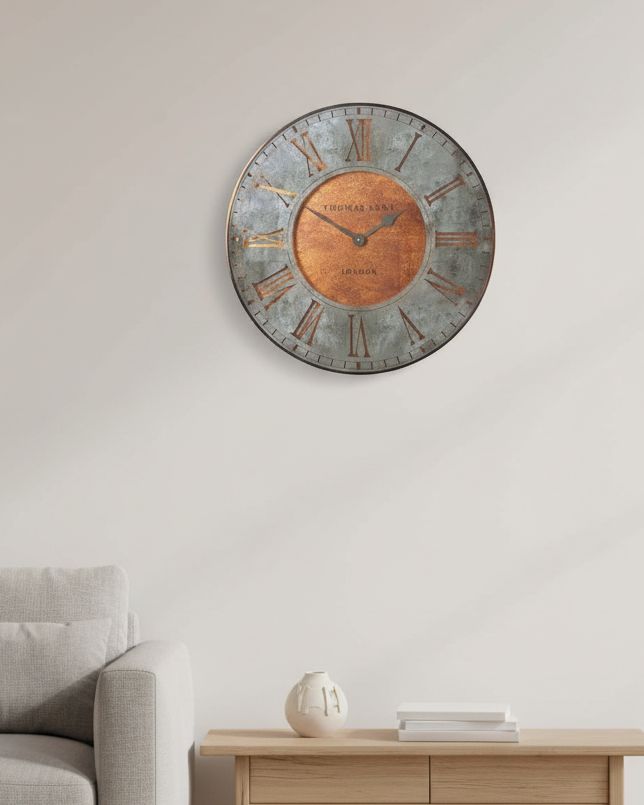 Gallery Direct Thomas Kent 21-inch Florentine Star wall clock with a vintage-inspired design and antique finish.