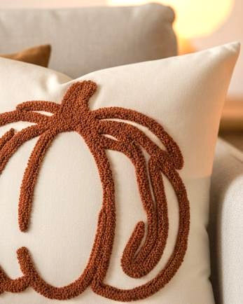 Orange Chenille Pumpkin Cushion Cover, close-up of the rust chenille pumpkin outline