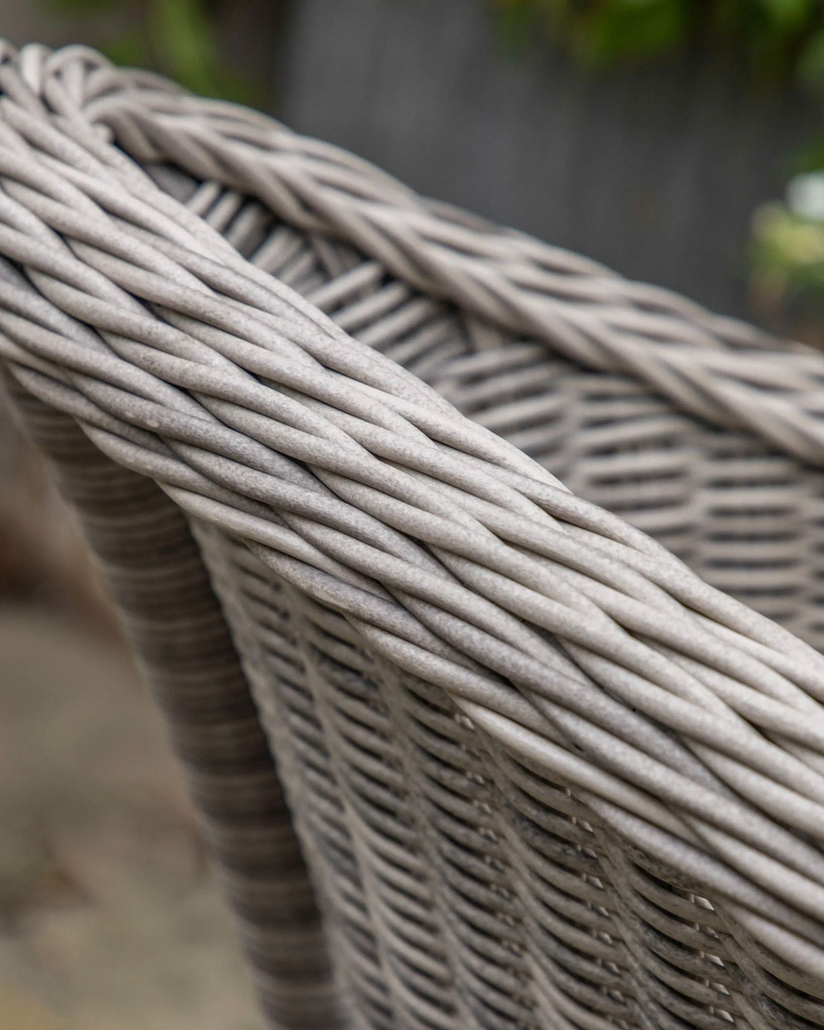Natural rattan Menton two-seat bistro set by Gallery Direct, featuring woven rattan garden furniture with matching chairs and table.