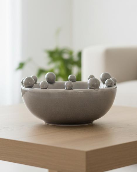 Small grey bobble bowl from Coach House, a stylish home decor piece with textured surface and rounded shape.