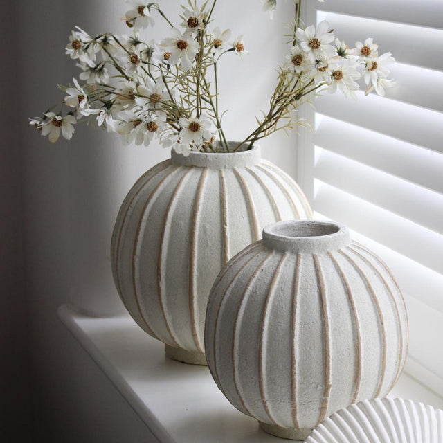 Decorative vase with globe striped pattern, Hill Interiors home décor piece, ceramic with blue and white design, suitable for display.