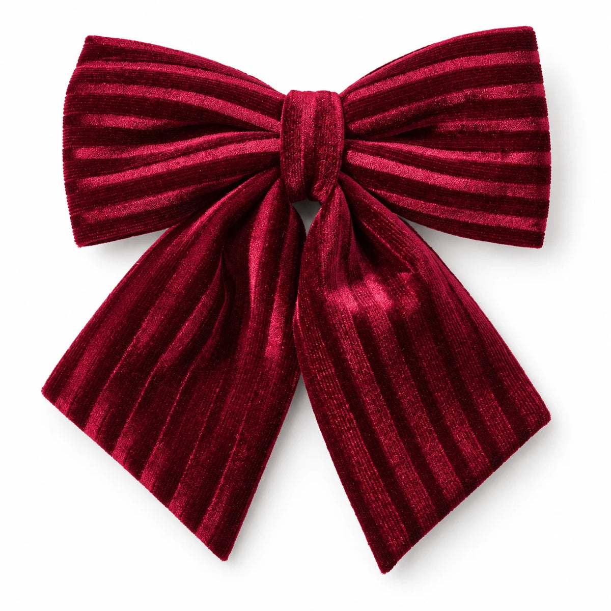 Small burgundy velvet bow showing its folded loops and broad tails against white.