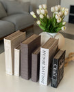 Set of two vintage grey Coach House storage book boxes with decorative design, ideal for home decor and organization.