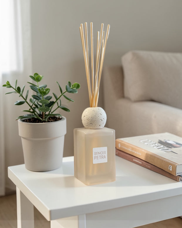 White Petra Reed Diffuser with travertine ball top and pink pepper scent, designed for home fragrance by Coach House.