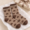 Cosy Cuff Socks - Beige Heart, beige socks with brown hearts beside a wrapped gift