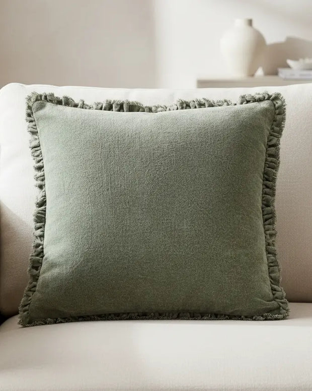 Olive green Bertie washed cotton velvet cushion cover by Riva Home, soft furnishings with a smooth, textured fabric appearance.