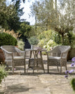 Natural rattan Menton two-seat bistro set for garden, includes woven rattan chairs and table, by Gallery Direct.