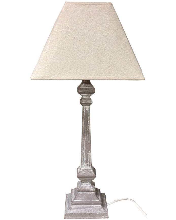 Pula wooden table lamp by Hill Interiors with a sleek design and warm wood finish, ideal for modern lighting decor.