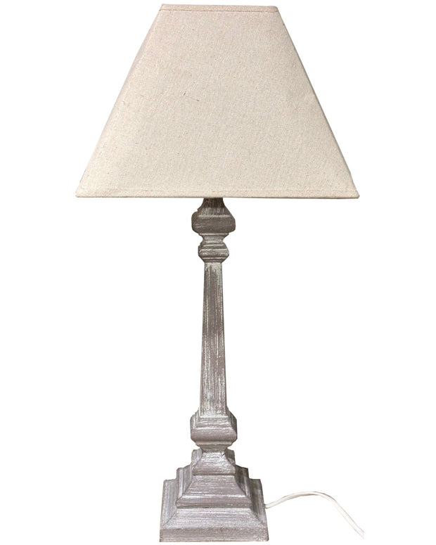 Pula wooden table lamp by Hill Interiors with a sleek design and warm wood finish, ideal for modern lighting decor.