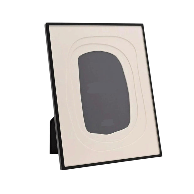 Wavy Black Colour Photo Frame White Border, black frame with wavy cream insert standing against white