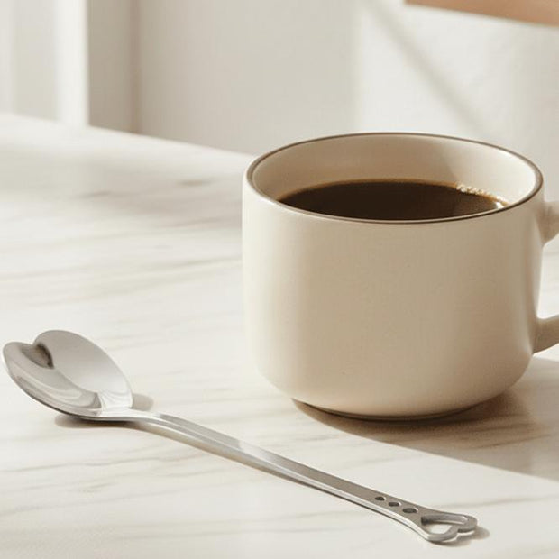 Silver heart handle spoon from Starlight Express, stylish kitchen and dining utensil with a decorative heart-shaped handle.