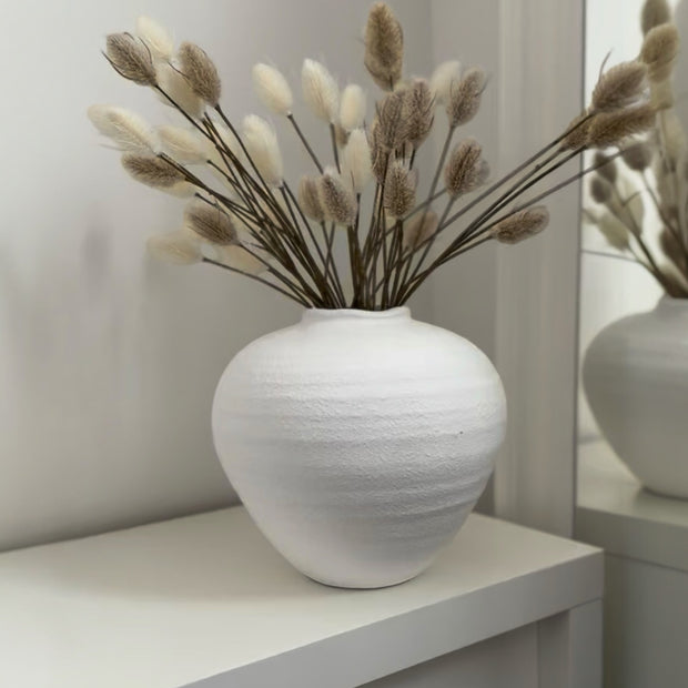 White stone vase from Hill Interiors' Regola collection, featuring a sleek, modern design perfect for home decor.