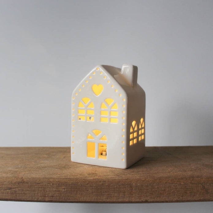 White heart-shaped LED light-up house for Christmas decor, branded Gainsborough Giftware x Portland Living.