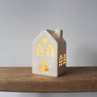 White heart-shaped LED light-up house for Christmas decor, branded Gainsborough Giftware x Portland Living.