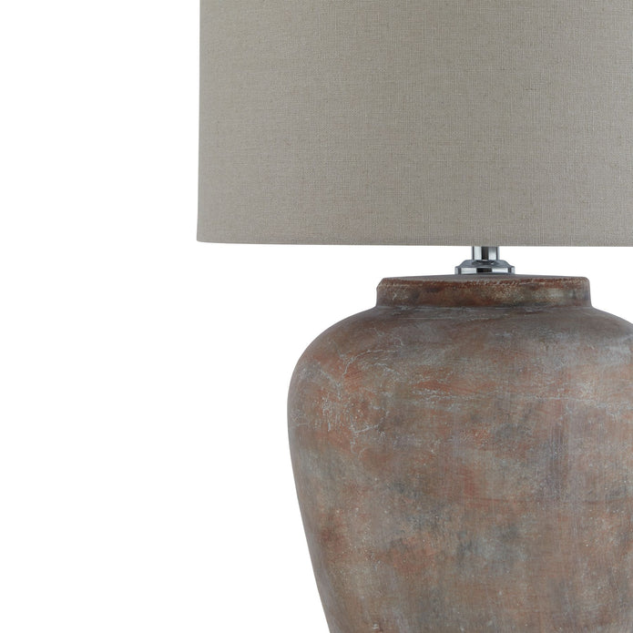 Medium matte brown ribbed stone lamp from Hill Interiors with a classic lighting design, ideal for adding warm ambiance to a room.