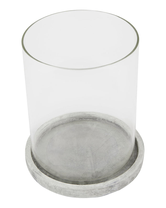 Natural stone hurricane candle lantern for home decor by Hill Interiors, featuring a rustic design with a glass candle holder inside.