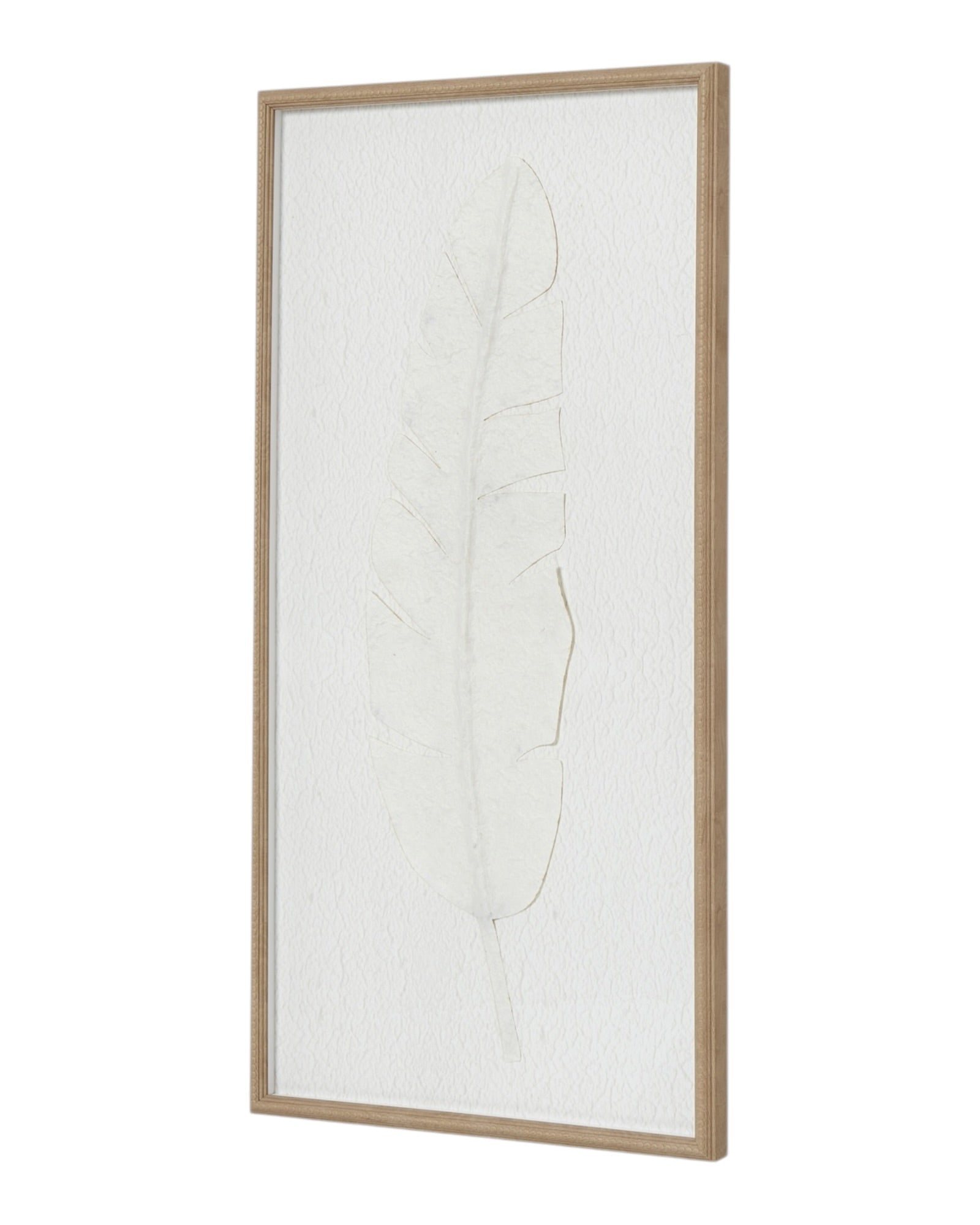 Large white feather print wall art in a frame, designed by Hill Interiors, displayed on a neutral wall.