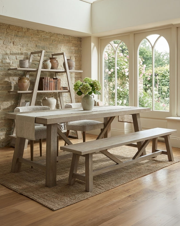 Large Haldon Collection dining table by Hill Interiors, showcasing a spacious wooden surface and modern furniture design.