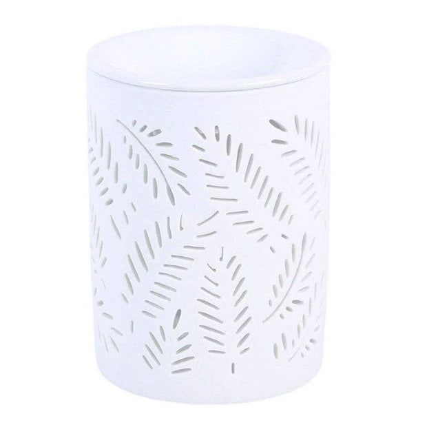 White leafy fern design wax melt burner and oil warmer with cut-out leaf patterns, ideal for aromatherapy and home fragrance.