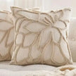 Beige flower embroidered boucle cushion cover by Starlight Express, soft furnishings, with floral embroidery and textured boucle fabric.