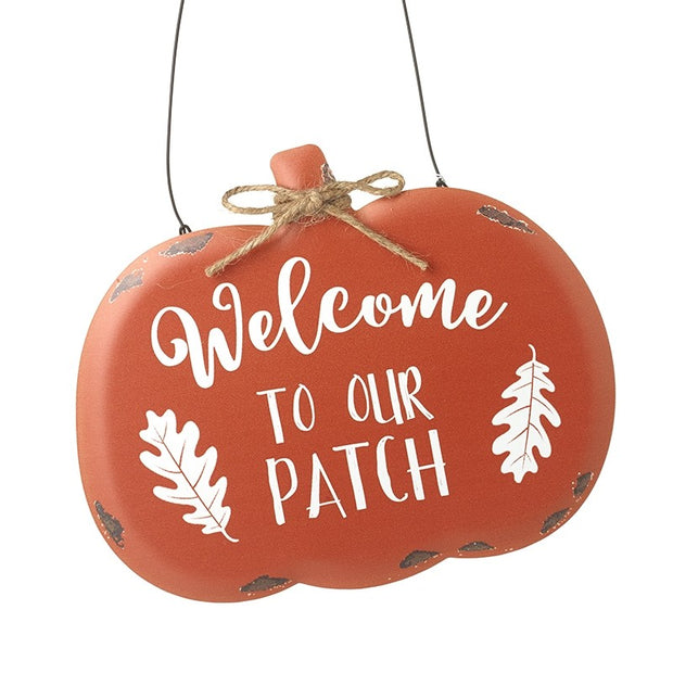 Welcome To Our Patch Pumpkin, close view of the orange hanging pumpkin sign