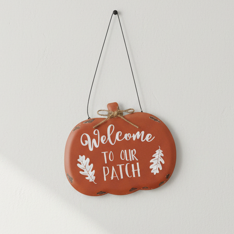Welcome To Our Patch Pumpkin, orange Welcome to Our Patch pumpkin sign hanging on a wall