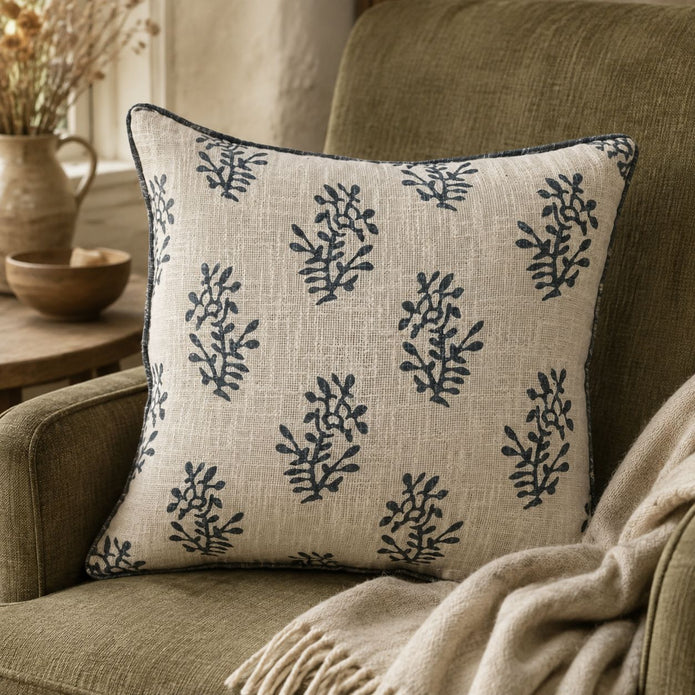 Grey Block Printed Reversible Flower Cushion Cover, cream cushion with grey sprigs on a green armchair