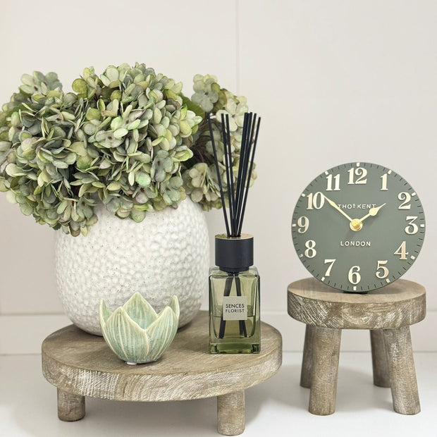Natural wooden round rustic display riser by Gisela Graham for home decor, available in small and large sizes.