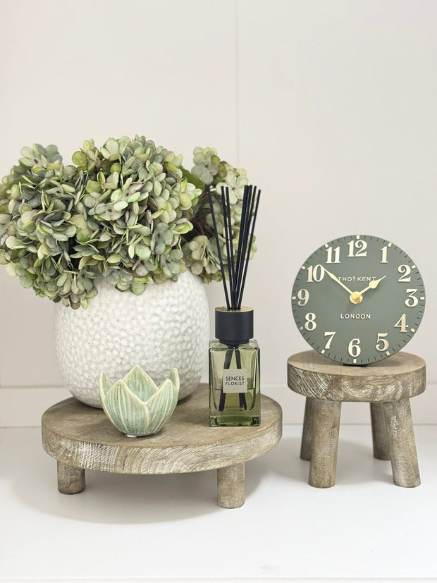 Natural wooden round rustic display riser by Gisela Graham for home decor, available in small and large sizes.