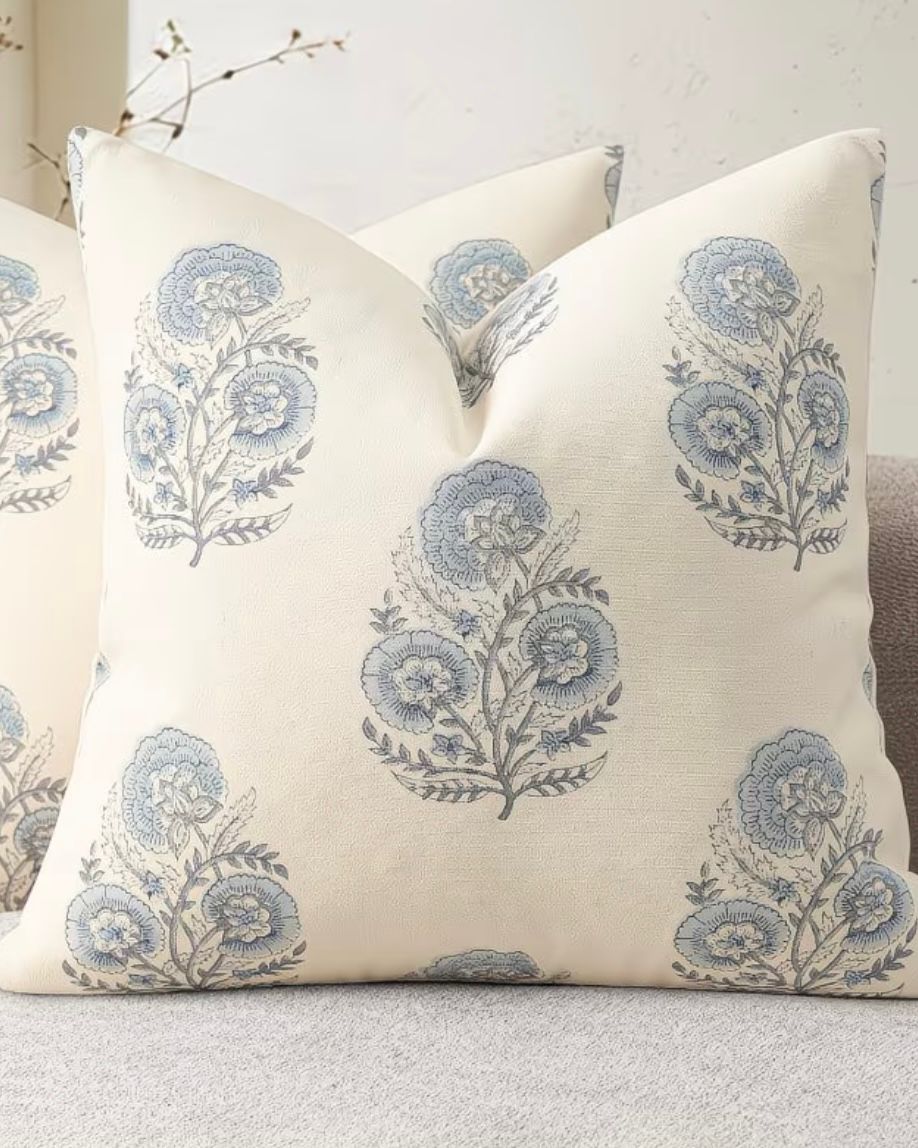 Blue floral velvet touch cushion cover by Starlight Express featuring a soft, decorative fabric with floral pattern design.