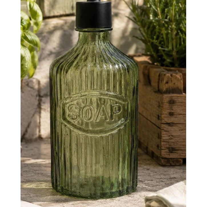 Green Glass Soap Dispenser With Black Pump, close-up of the embossed Soap lettering and ribbed glass