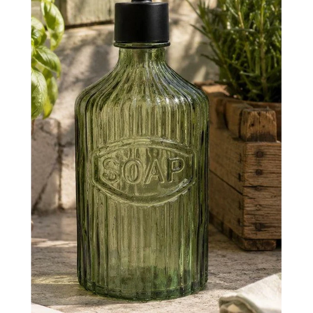 Green Glass Soap Dispenser With Black Pump, close-up of the embossed Soap lettering and ribbed glass
