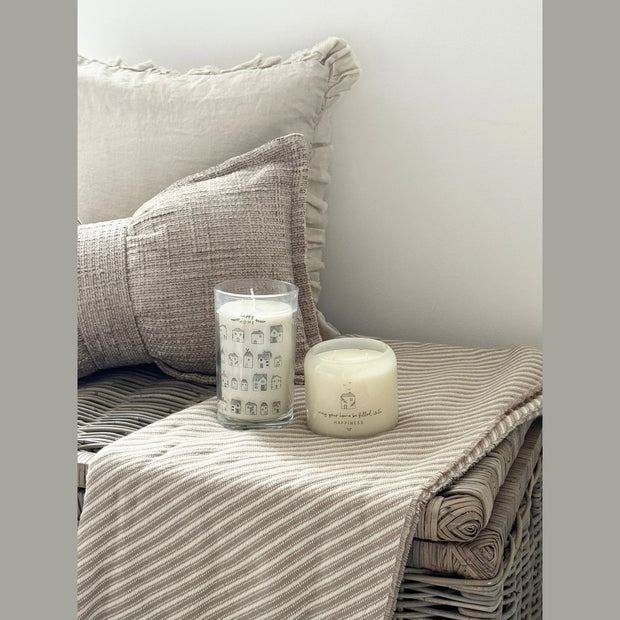 Beige Moments Tall Candle - Home, tall Home candle and round candle on a striped throw