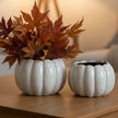 White ceramic pumpkin plant pot for autumn decor by Gainsborough Giftware, featuring a smooth, round design perfect for seasonal arrangements.