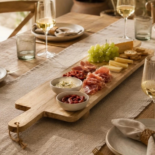 Extra Large Footed Serving Tapas Board, long wooden serving board with grazing food on a dining table