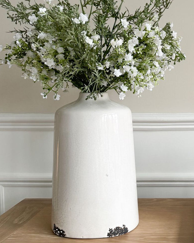 White glazed Liv vase by Hill Interiors, showcasing a sleek, modern ceramic vase with smooth white glaze finish.